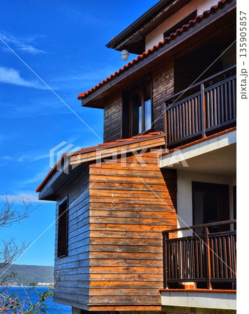 Modern Seaside Architecture with Wooden Facade and Balconies in Traditional Bulgarian Style Modern Seaside Architecture with Wooden Facade and Balconies in Traditional Bulgarian Style 135905857