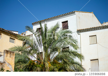 Unique whitewashed village built into dramatic rock formations, offers one of Andalusia most picturesque sights in Setenil de las Bodegas, Spain Unique whitewashed village built into dramatic rock formations, offers one of Andalusia most picturesque sights in Setenil de las Bodegas, Spain 135906898