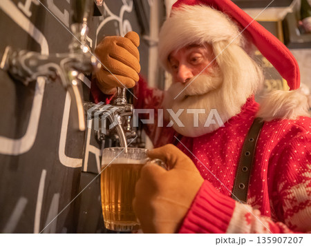 Santa Claus pouring beer in a pub.  135907207
