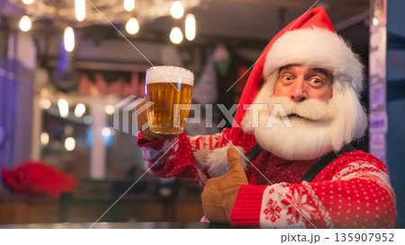 Santa Claus drinking beer at a bar. Santa Claus drinking beer at a bar. 135907952