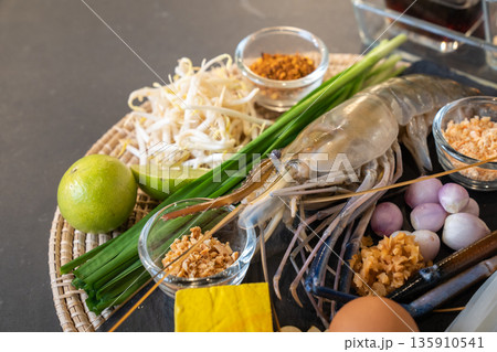 Pad Thai has a main ingredient such as noodle, shrimp, garlic chives, yellow tofu, chilli powder, shallot, fish sauce, palm sugar,and much more. Pad Thai has a main ingredient such as noodle, shrimp, garlic chives, yellow tofu, chilli powder, shallot, fish sauce, palm sugar,and much more. 135910541