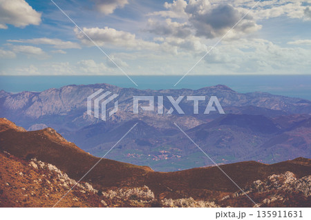 View of the beautiful mountain landscape from the Mirador de la Reina. Peaks of Europe National Park (Picos de Europa). Asturias, Spain View of the beautiful mountain landscape from the Mirador de la Reina. Peaks of Europe National Park (Picos de Europa). Asturias, Spain 135911631