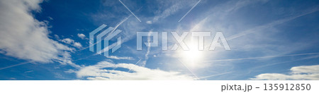 Blue sky with clouds. Cloudy sky background. Horizontal banner Blue sky with clouds. Cloudy sky background. Horizontal banner 135912850