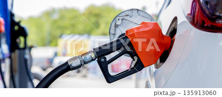 Refill and filling Oil Gas Fuel at station. Gas station - refueling.  135913060