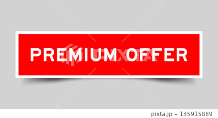 Red color square shape sticker label with word premium offer on gray background Red color square shape sticker label with word premium offer on gray background 135915889