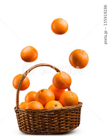 Orange fruits in a wicker basket 135919286