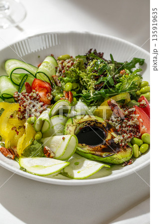 Green salad with avocado quinoa and vegetables Green salad with avocado quinoa and vegetables 135919635