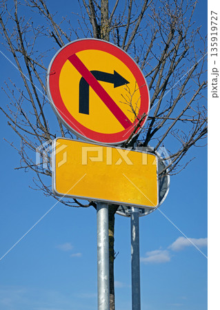Arrow traffic sign outside on street Arrow traffic sign outside on street 135919727