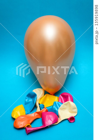 Colorful balloons on blue background Colorful balloons on blue background 135919898