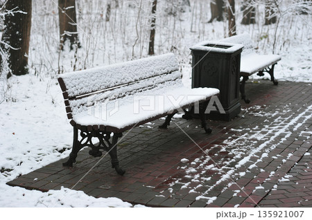 snow-covered bench in Tsaritsyno Park in Moscow snow-covered bench in Tsaritsyno Park in Moscow 135921007