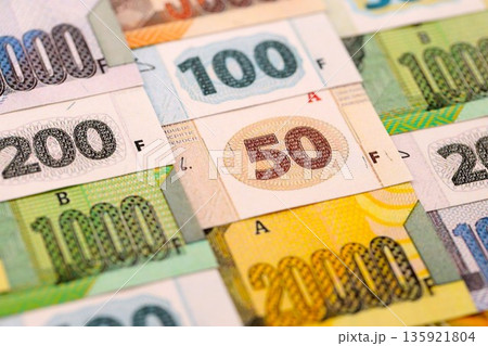 Congolese franc money bills in big amount on table close up. Rich life concept in Democratic Republic of Congo. Business and economy 135921804