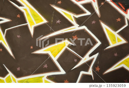 Colorful background of graffiti painting artwork with bright aerosol outlines on wall. Old school street art piece made with aerosol spray paint cans. Contemporary youth culture backdrop Colorful background of graffiti painting artwork with bright aerosol outlines on wall. Old school street art piece made with aerosol spray paint cans. Contemporary youth culture backdrop 135923059