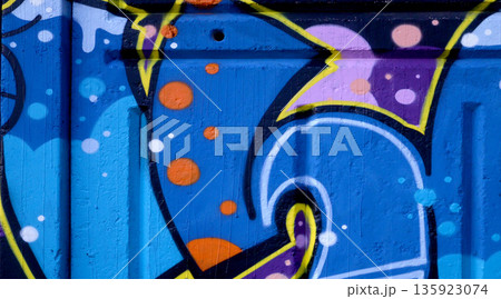 Colorful background of graffiti painting artwork with bright aerosol outlines on wall. Old school street art piece made with aerosol spray paint cans. Contemporary youth culture backdrop Colorful background of graffiti painting artwork with bright aerosol outlines on wall. Old school street art piece made with aerosol spray paint cans. Contemporary youth culture backdrop 135923074