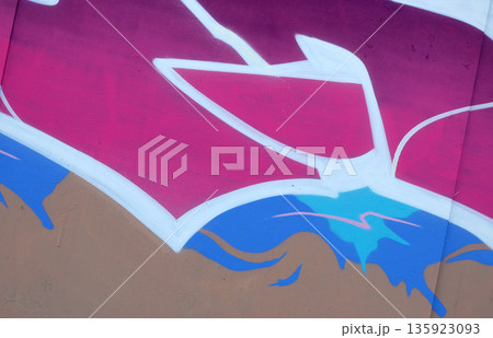 Colorful background of graffiti painting artwork with bright aerosol outlines on wall. Old school street art piece made with aerosol spray paint cans. Contemporary youth culture backdrop Colorful background of graffiti painting artwork with bright aerosol outlines on wall. Old school street art piece made with aerosol spray paint cans. Contemporary youth culture backdrop 135923093