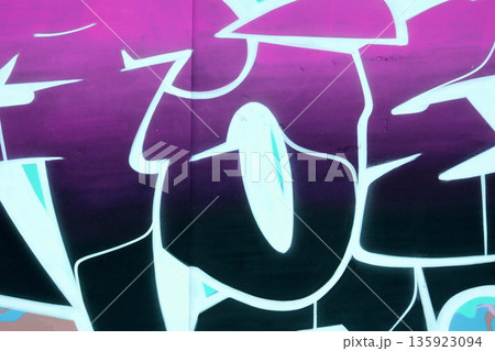 Colorful background of graffiti painting artwork with bright aerosol outlines on wall. Old school street art piece made with aerosol spray paint cans. Contemporary youth culture backdrop Colorful background of graffiti painting artwork with bright aerosol outlines on wall. Old school street art piece made with aerosol spray paint cans. Contemporary youth culture backdrop 135923094