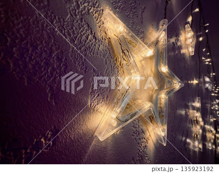 Bright Star Lanterns Cast Enchanting Glow Over Icy Fields During Festivities 135923192