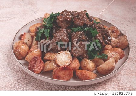 kuyrdak, roast offal with potatoes and fresh herbs, homemade in Kazakh, no people, kuyrdak, roast offal with potatoes and fresh herbs, homemade in Kazakh, no people, 135923775