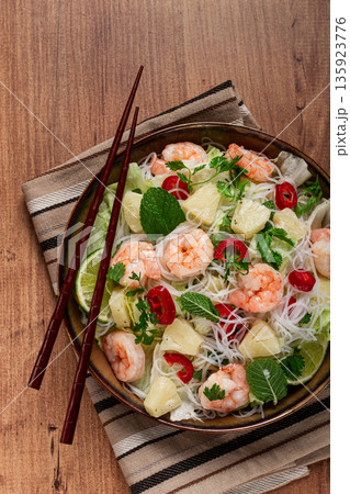 Thai salad with shrimp and rice noodles, pineapple slices, coriander and mint leaves, homemade , no people, Thai salad with shrimp and rice noodles, pineapple slices, coriander and mint leaves, homemade , no people, 135923776