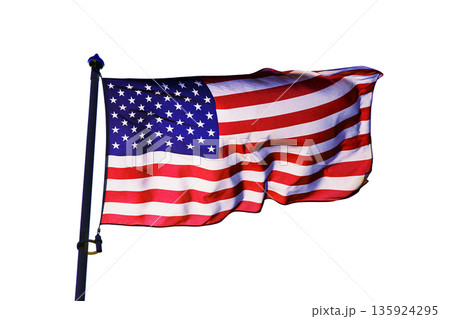 Flag of United States waving on flagpole isolated on a clean white background. American flag cutout on white 135924295