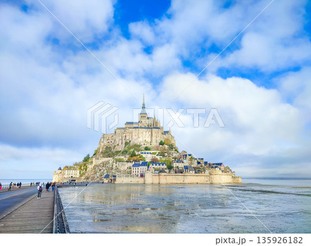Historic Mont Saint-Michel island with medieval architecture and tidal waters Historic Mont Saint-Michel island with medieval architecture and tidal waters 135926182