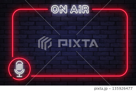 Neon on air sign with microphone icon inside glowing frame on brick background. Broadcast atmosphere suited for radio shows, podcasts, or streaming graphics. 135926477