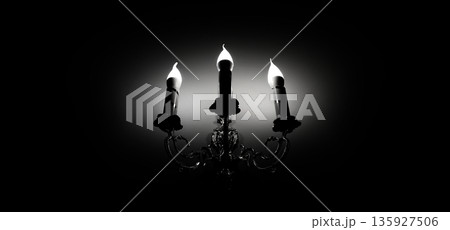 Monochrome Stock Photo of a Candlestick Form Electric Wall Lantern Shine in Darkness. Three Lit Candles on Ornate Candelabra Grayscale Image Monochrome Stock Photo of a Candlestick Form Electric Wall Lantern Shine in Darkness. Three Lit Candles on Ornate Candelabra Grayscale Image 135927506