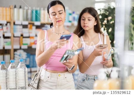 Mom and teen scan toothbrush packs Mom and teen scan toothbrush packs 135929612