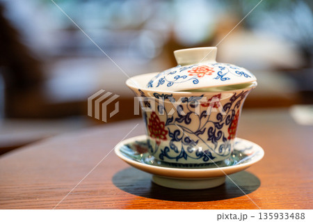 Tea cup on table in Chengdu restaurant showcasing local craftsmanship in Sichuan Tea cup on table in Chengdu restaurant showcasing local craftsmanship in Sichuan 135933488