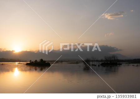 A nature view of sunset or sunrise over lake at Phang Nga Thailand A nature view of sunset or sunrise over lake at Phang Nga Thailand 135933981