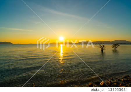 Landscape view of majestic clouds in the sky sunset or sunrise over sea with reflection in the tropical sea,Beautiful cloudscape scenery,Amazing light of nature Landscape nature background 135933984