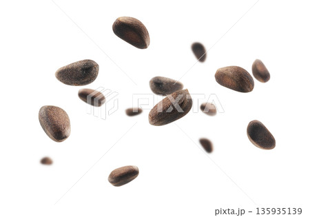 Pine nuts levitate on a white background 135935139