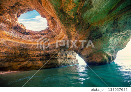 Coastal rocky seascape. View of Benagil cave in Algarve region of Atlantic Ocean, Portugal, Europe 135937635