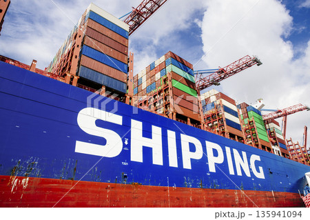 Shipping containers and cargo ship Shipping containers and cargo ship 135941094