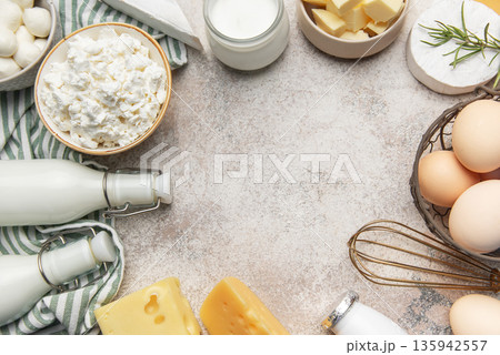 Dairy products and eggs framing food ingredients concept Dairy products and eggs framing food ingredients concept 135942557