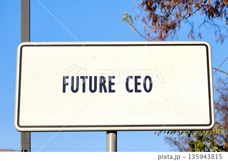 A clear sign reading Future CEO stands under a sunny blue sky, symbolizing ambition and leadership. The scene captures the essence of dreams and aspirations for tomorrow A clear sign reading Future CEO stands under a sunny blue sky, symbolizing ambition and leadership. The scene captures the essence of dreams and aspirations for tomorrow 135943815