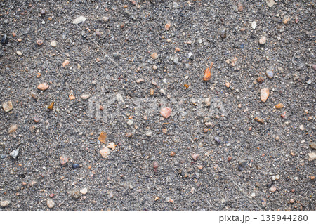 Seamless asphalt texture. Asphalt texture close-up. Road surface with small stones. 135944280