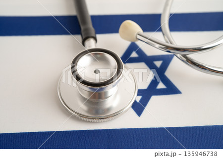 Stethoscope on Israel flag, business and finance. Stethoscope on Israel flag, business and finance. 135946738
