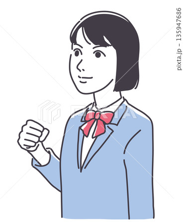 拳を握る女子学生 135947686