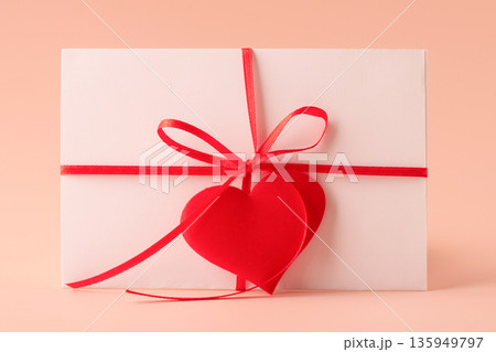 Love letter envelope with red heart ribbon Love letter envelope with red heart ribbon 135949797