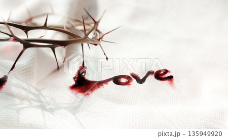 The cross with the crown of thorns symbolizing the sacrifice and suffering of Jesus Christ, the LOVE lettering stained with blood, the concept of Holy Week, Lent, and Easter 135949920