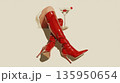 Enjoying a drink with stylish boots 135950654