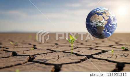 Earth planet above cracked soil with green sprouts symbolizing climate change sustainability and future hope 135951315