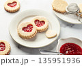 Linzer cookies in shape of heart with jam on white marble background. Mother's day, Valentine's day. Homemade present 135951936
