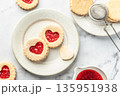 Linzer cookies in shape of heart with jam on white marble background. Mother's day, Valentine's day. Homemade present 135951938