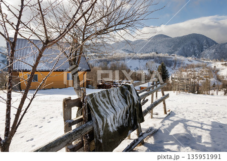 Snowy mountain village in winter, Carpathian Mountains, Romania 135951991