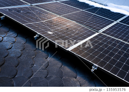 Solar panels on slate roof. Clean energy solution Solar panels on slate roof. Clean energy solution 135953576