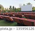 Outdoor cinema with white projection screen 135956126