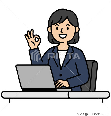 PCの前で笑顔でOKサインを出す紺色のスーツの女性 135956556