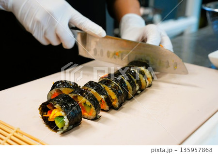 Korean Kimbap: The Culinary Process of Rolling and Slicing Gimbap Korean Kimbap: The Culinary Process of Rolling and Slicing Gimbap 135957868