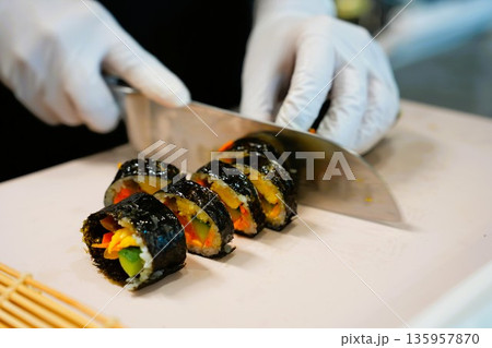 Korean Kimbap: The Culinary Process of Rolling and Slicing Gimbap Korean Kimbap: The Culinary Process of Rolling and Slicing Gimbap 135957870